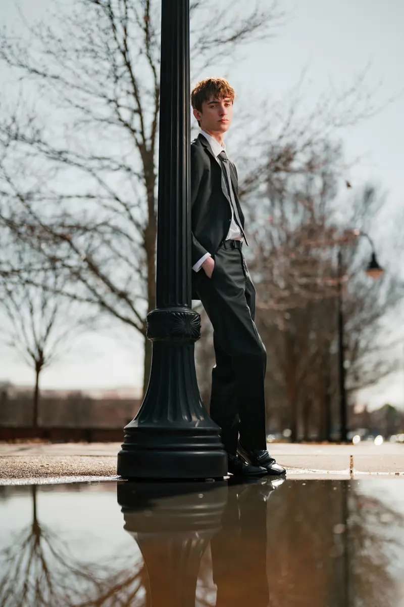 Senior portrait with cinematic, architectural light