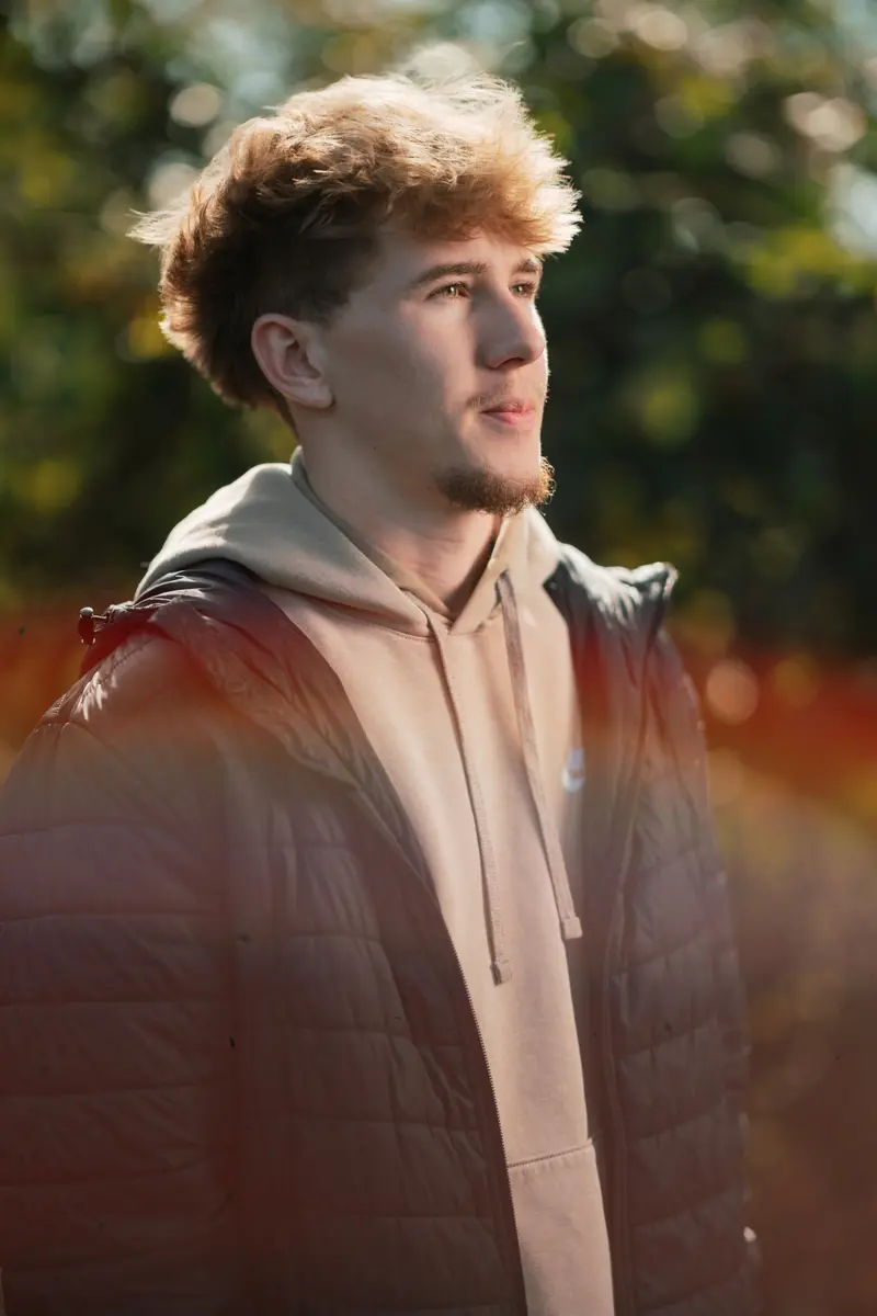 Senior portrait with architectural scale and presence