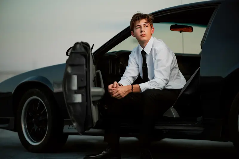 Bold senior portrait with dramatic, intentional light