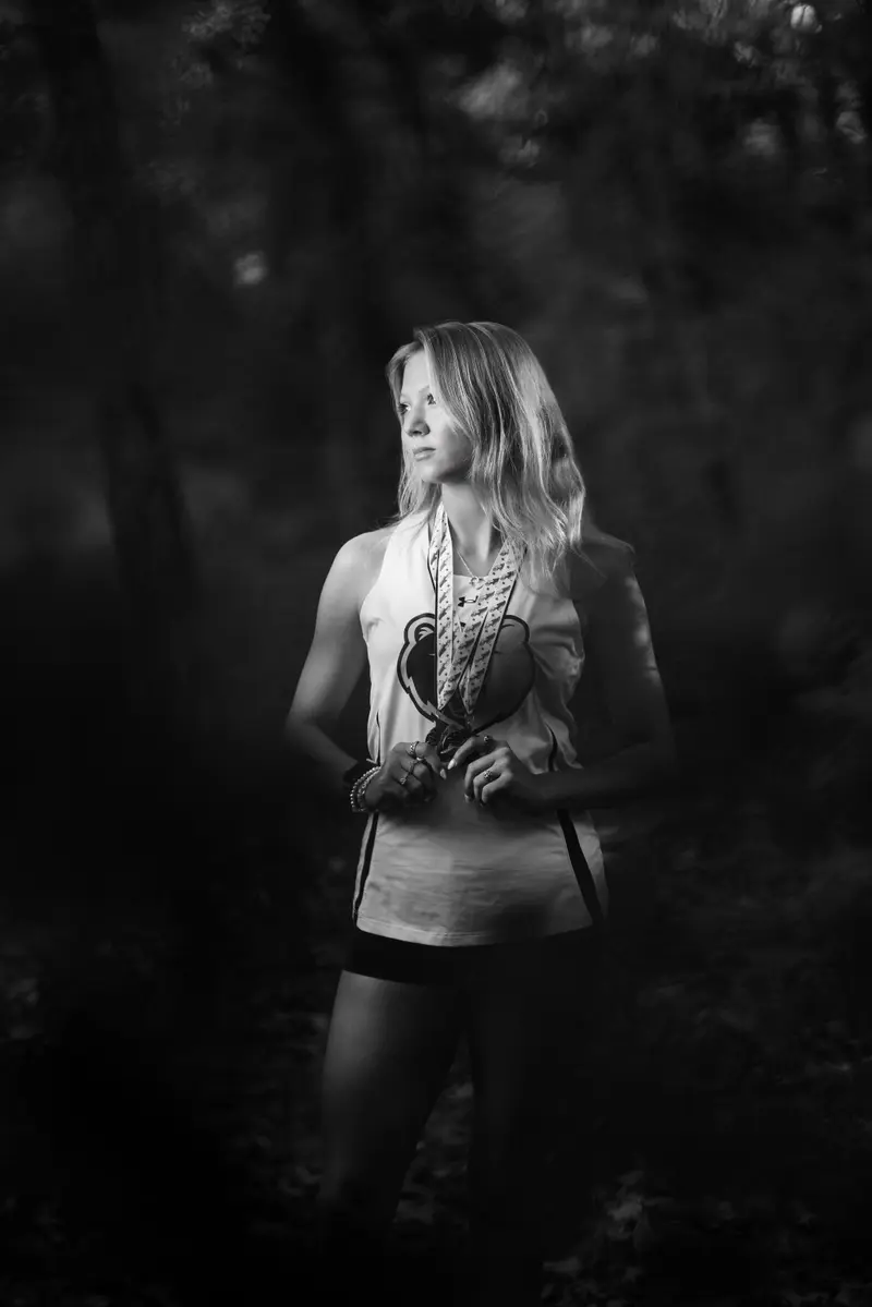 Senior portrait with warm cinematic tones