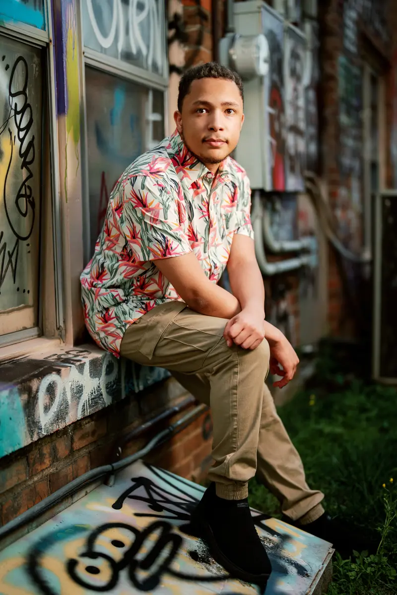 Senior portrait with dramatic cinematic presence