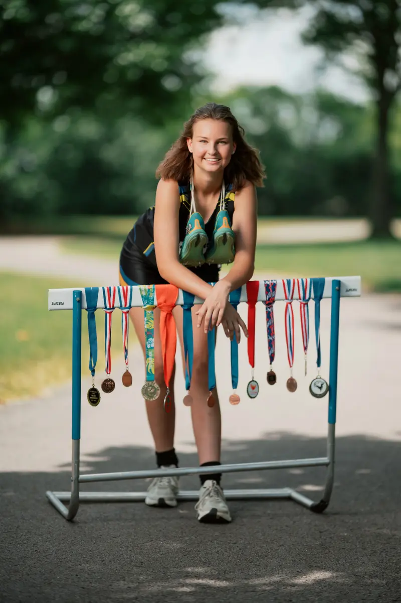 Cinematic senior portrait with expressive posing
