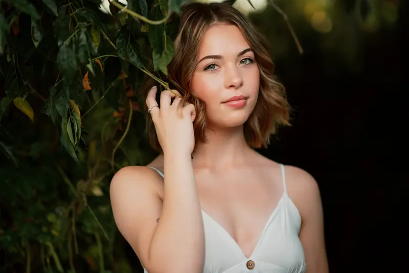 Senior portrait with warm cinematic light